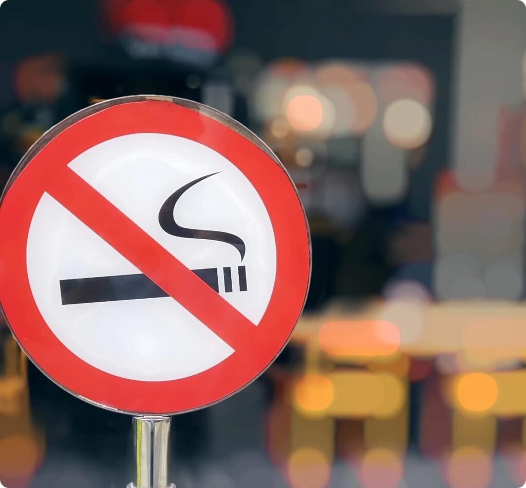 close-up-circular-red-and-white-no-smoking-sign-at-2024-05-27-06-52-32-utc@2x