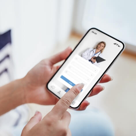 female-exploring-options-on-health-app-via-her-sma-2023-12-13-19-34-58-utc (1)