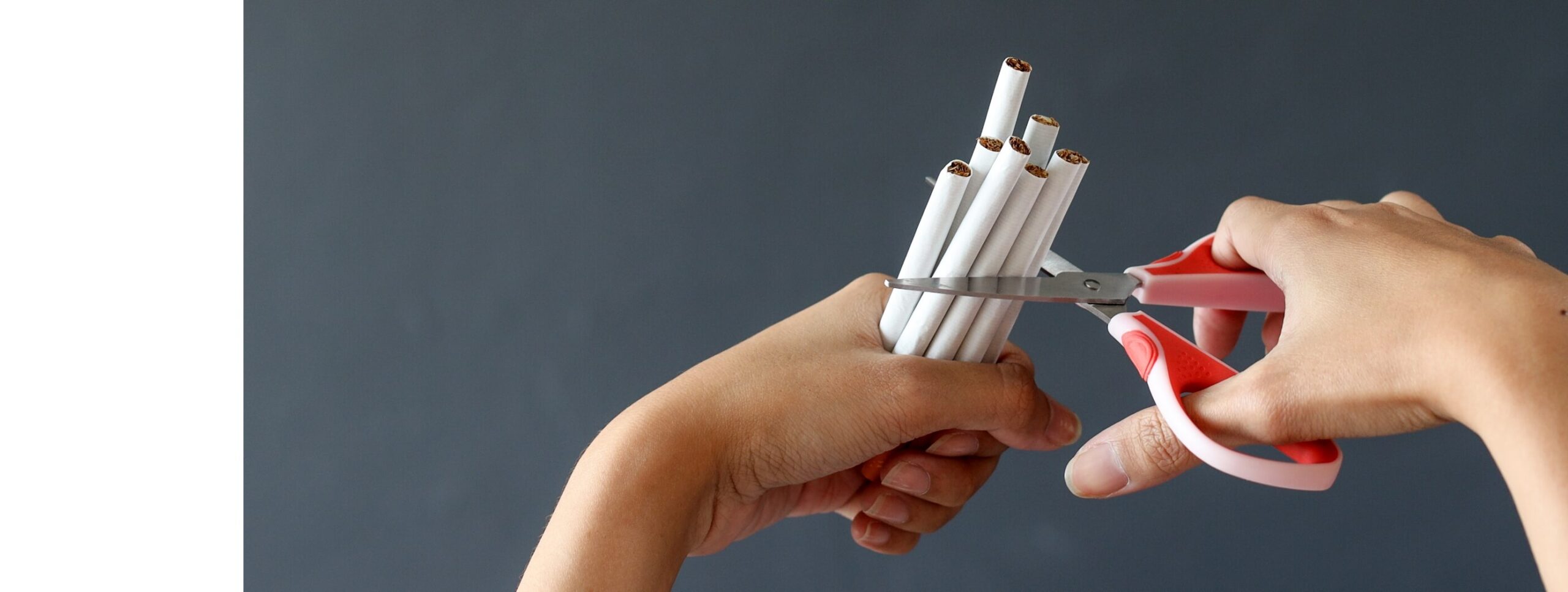 hand-crushing-cigarette-using-scissor-concept-of-2023-11-27-05-10-30-utc (1)