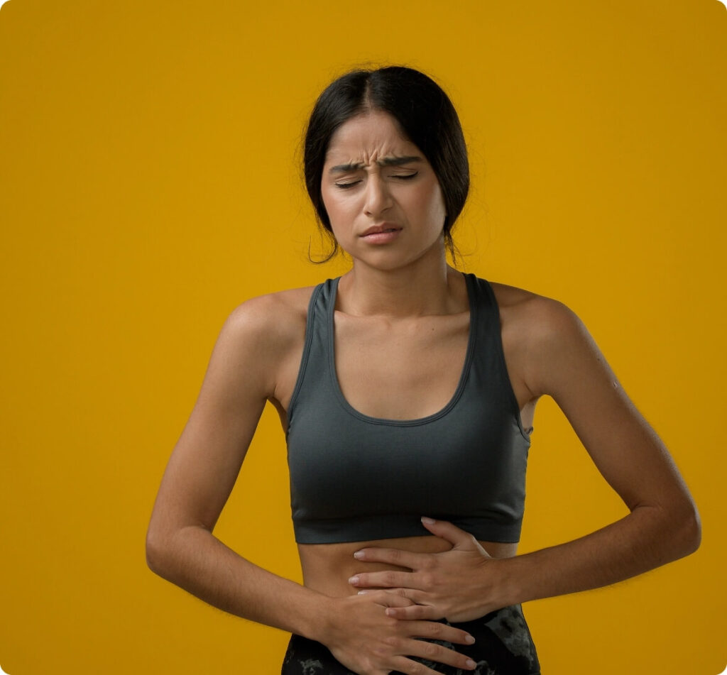 sick-ill-indian-woman-suffering-from-stomach-ache-2023-11-27-05-11-48-utc@2x