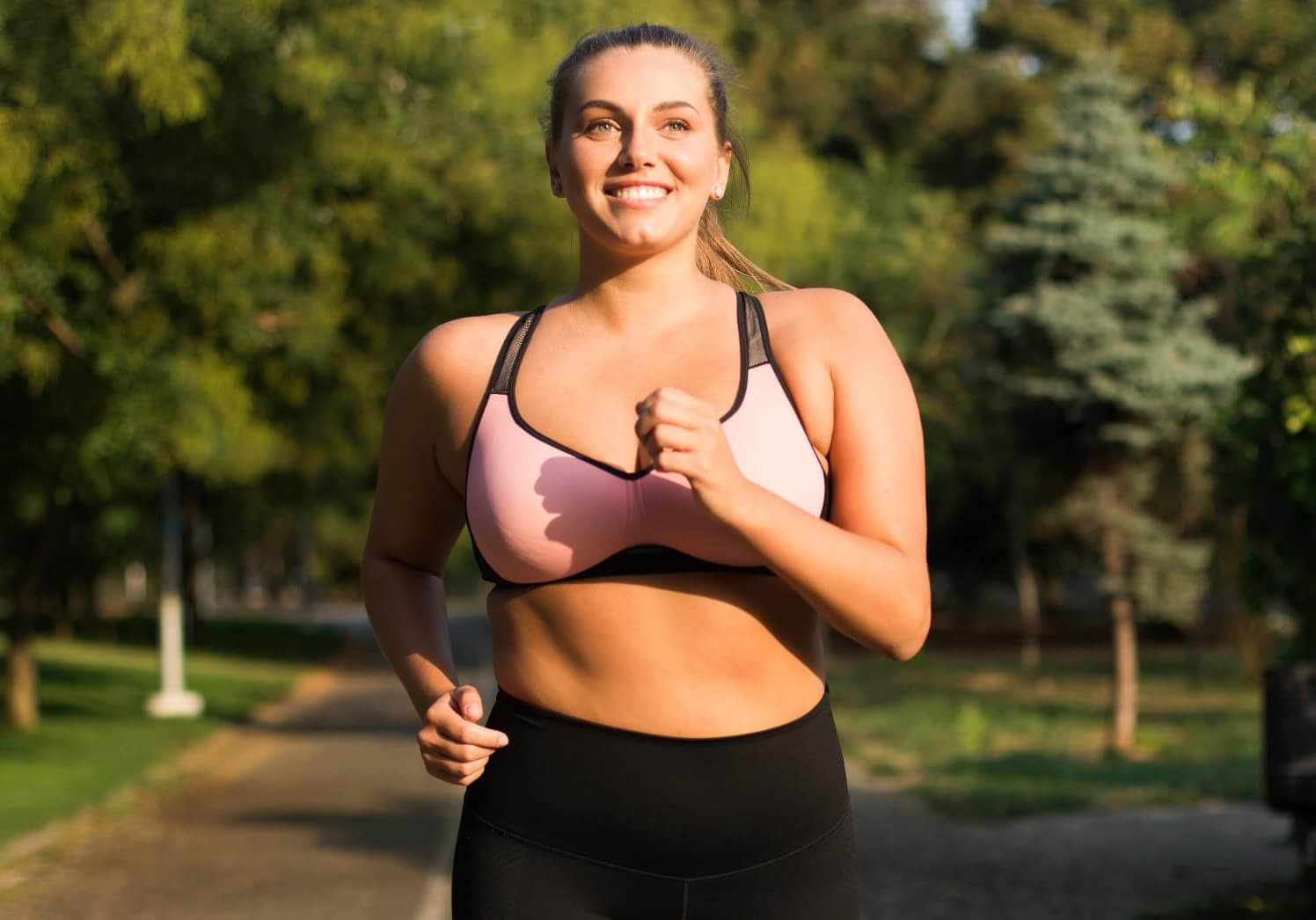 young-cheerful-plus-size-woman-in-pink-sporty-top-2023-11-27-05-35-03-mob (1)