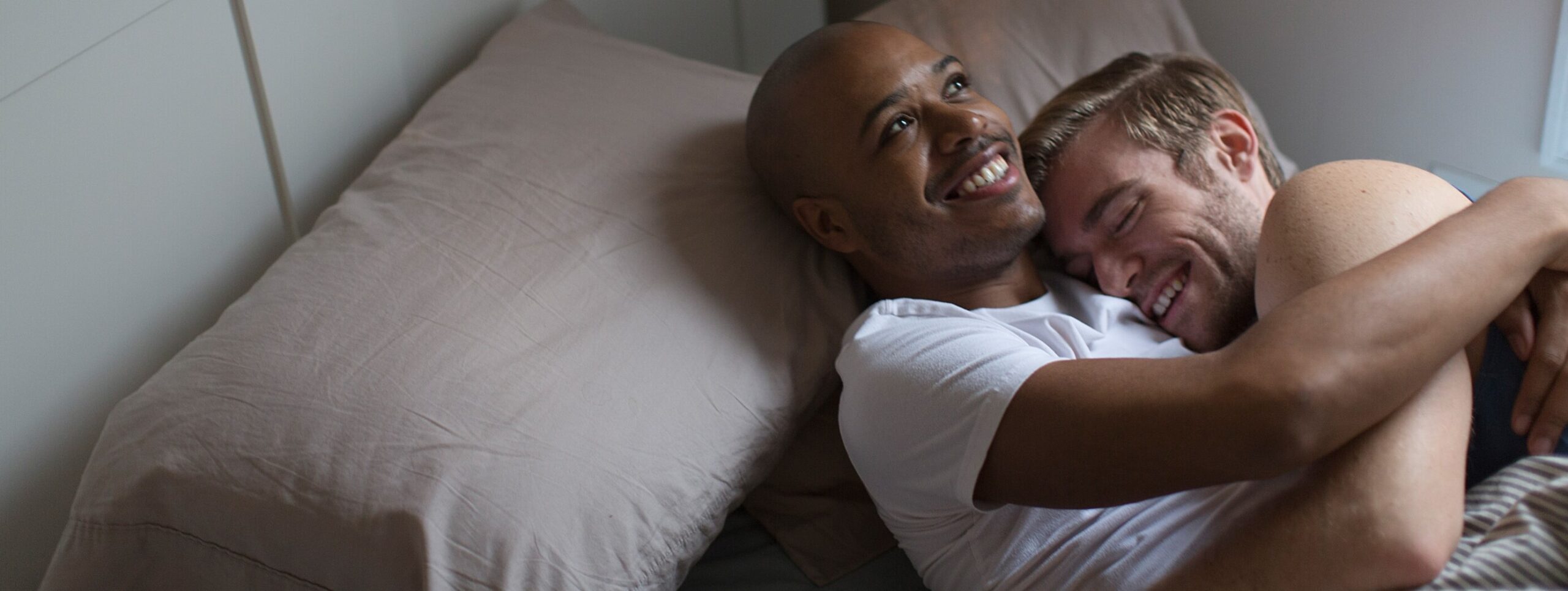 male-couple-lying-in-bed-together-hugging-2024-11-03-03-47-15-utc (1)