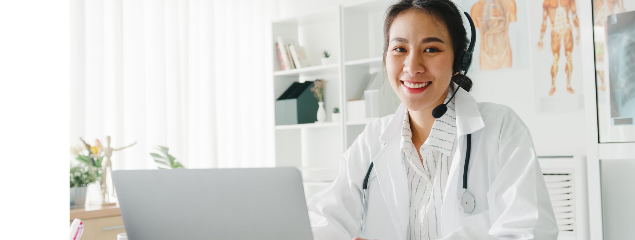 young-lady-doctor-using-computer-laptop-talk-video-2024-11-02-06-02-02-utc